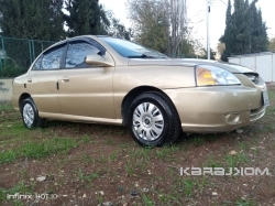 كيا ريو 2003 شكل 2005 جير اتوماتيك فحص 2 جيد 2 قصعات رواسي ومرفق الفحص 