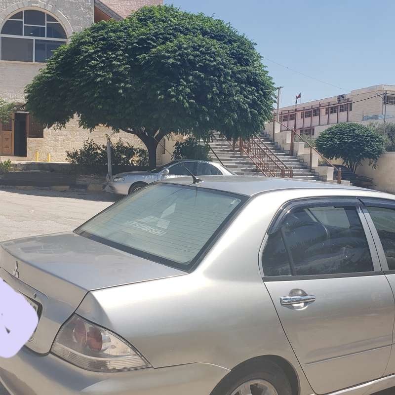 لانسر ٢٠٠٩ ترخيص لشهر ٢كوتشوك وكاله 