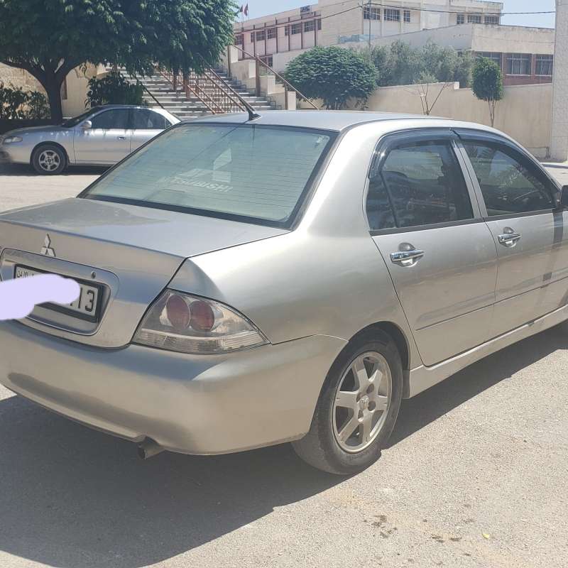 لانسر ٢٠٠٩ ترخيص لشهر ٢كوتشوك وكاله 