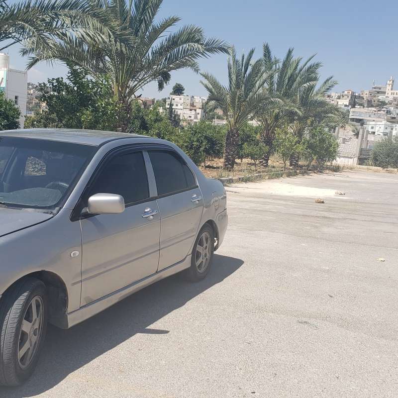 لانسر ٢٠٠٩ ترخيص لشهر ٢كوتشوك وكاله 