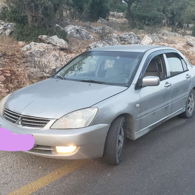 لانسر ٢٠٠٩ ترخيص لشهر ٢كوتشوك وكاله 