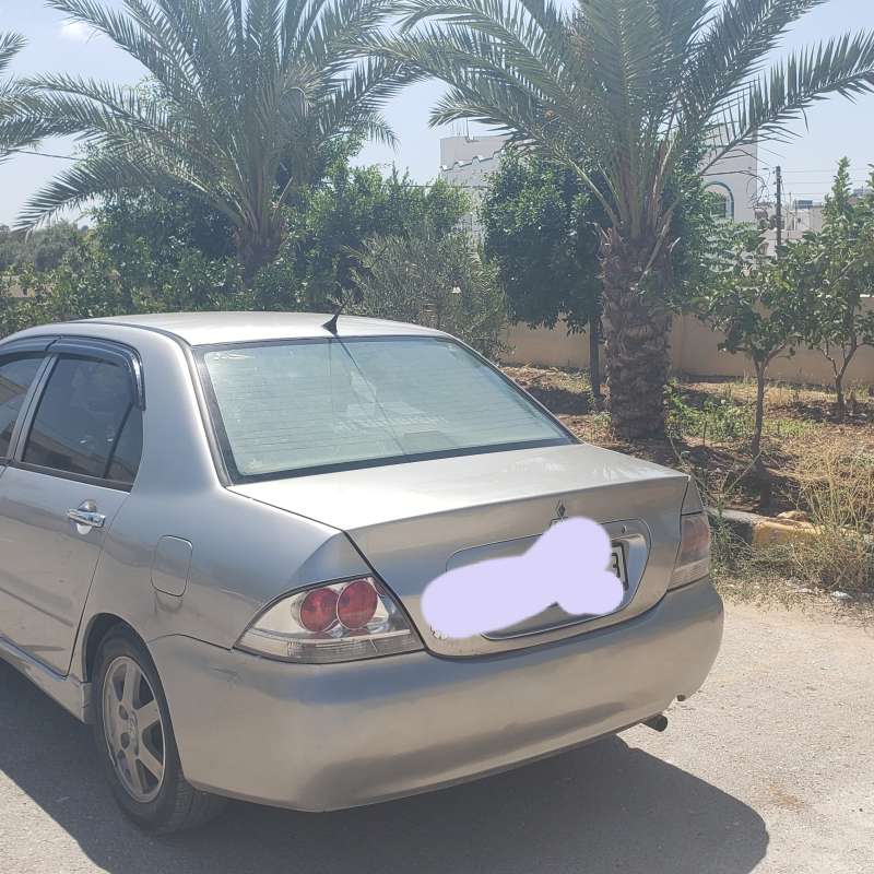 لانسر ٢٠٠٩ ترخيص لشهر ٢كوتشوك وكاله 