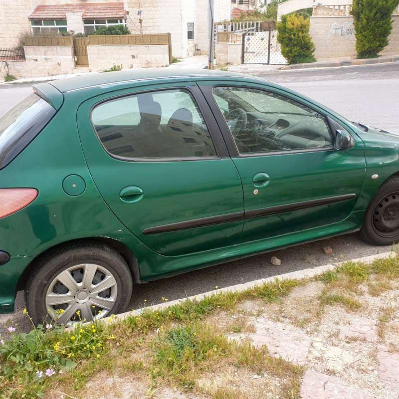 بيجو 206 لون اخضر 