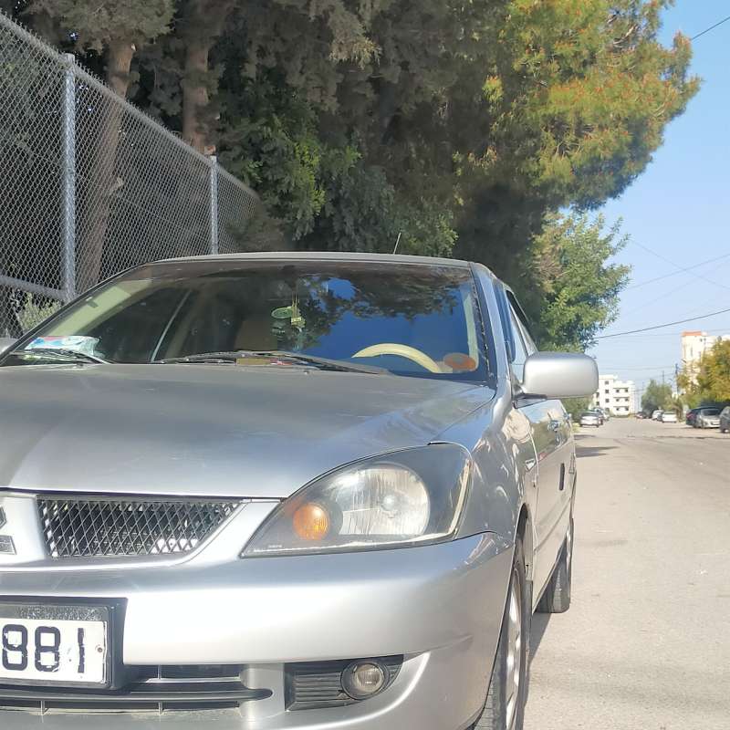 سياره متسوبيشي لانسر للبيع