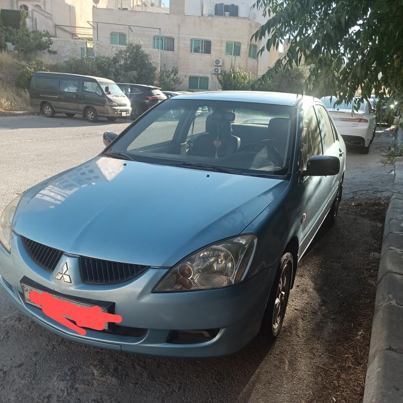 سيارة لانسر 2004