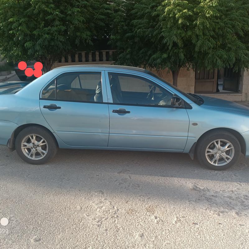 سيارة لانسر 2004
