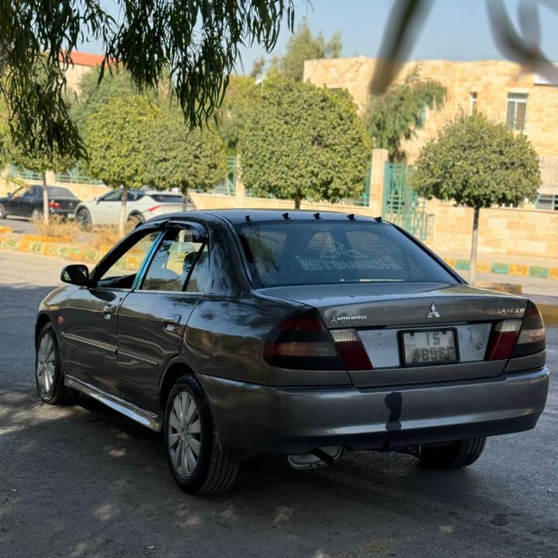 متسوبيشي لانسر ٩٩ فل اوتمتك مع الجير اقساط