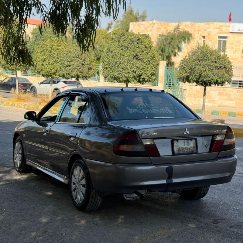 متسوبيشي لانسر ٩٩ فل اوتمتك مع الجير اقساط