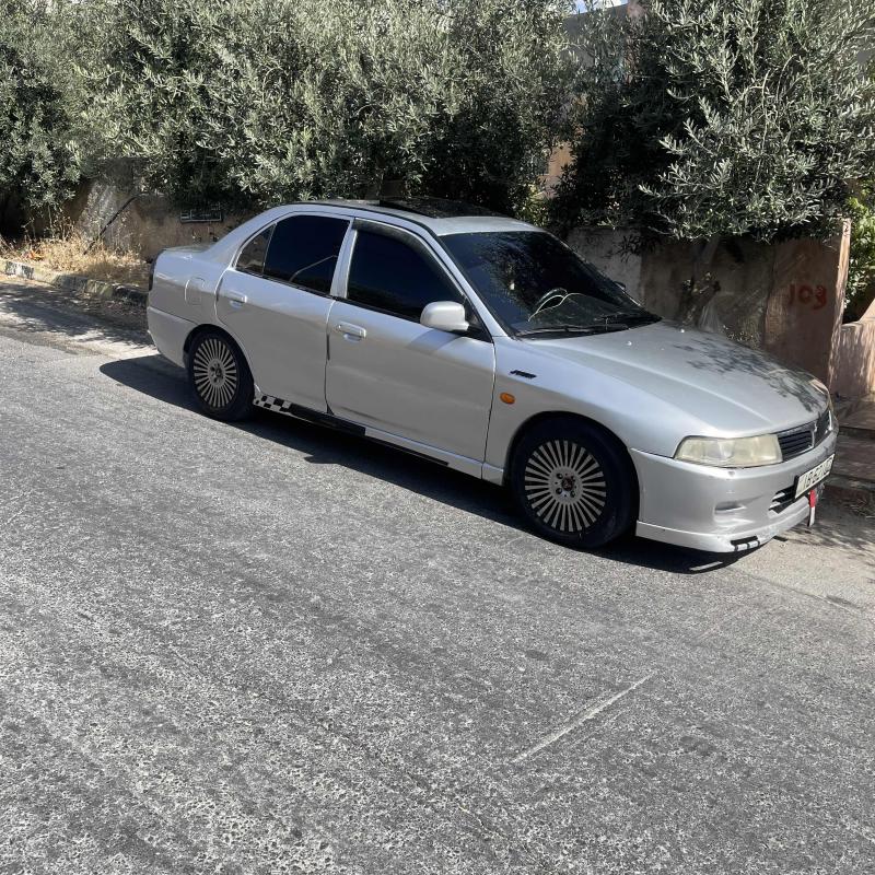 ميتسوبيشي لانسر موديل ٢٠٠٠ اوتوماتيك 