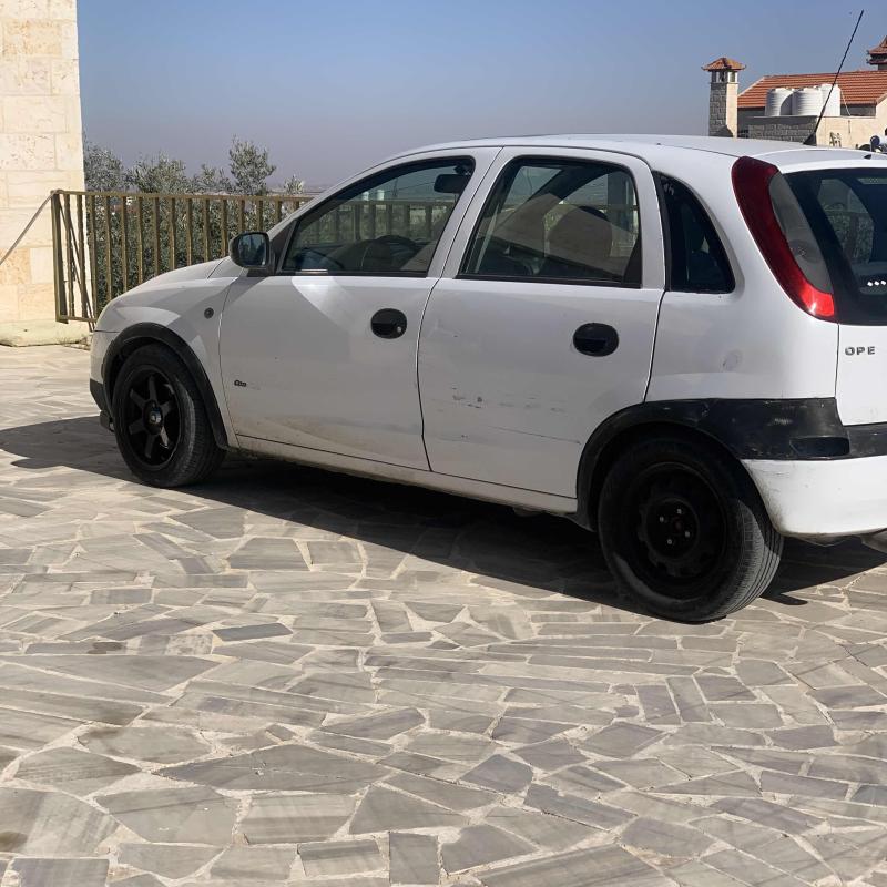 اوبل كورسا ٢٠٠٣مأمنه ومرخصه اوتوماتيك