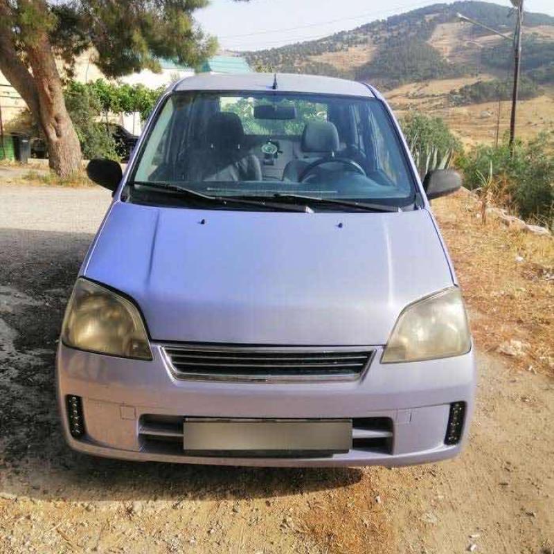 ديهاتسو شاريد بحاله ممتازه 