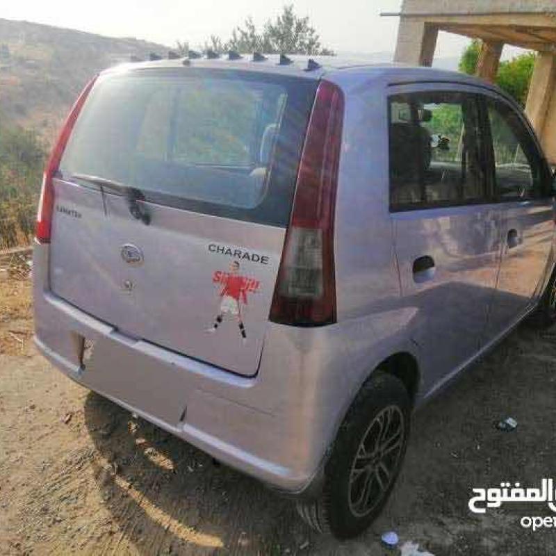 ديهاتسو شاريد بحاله ممتازه 