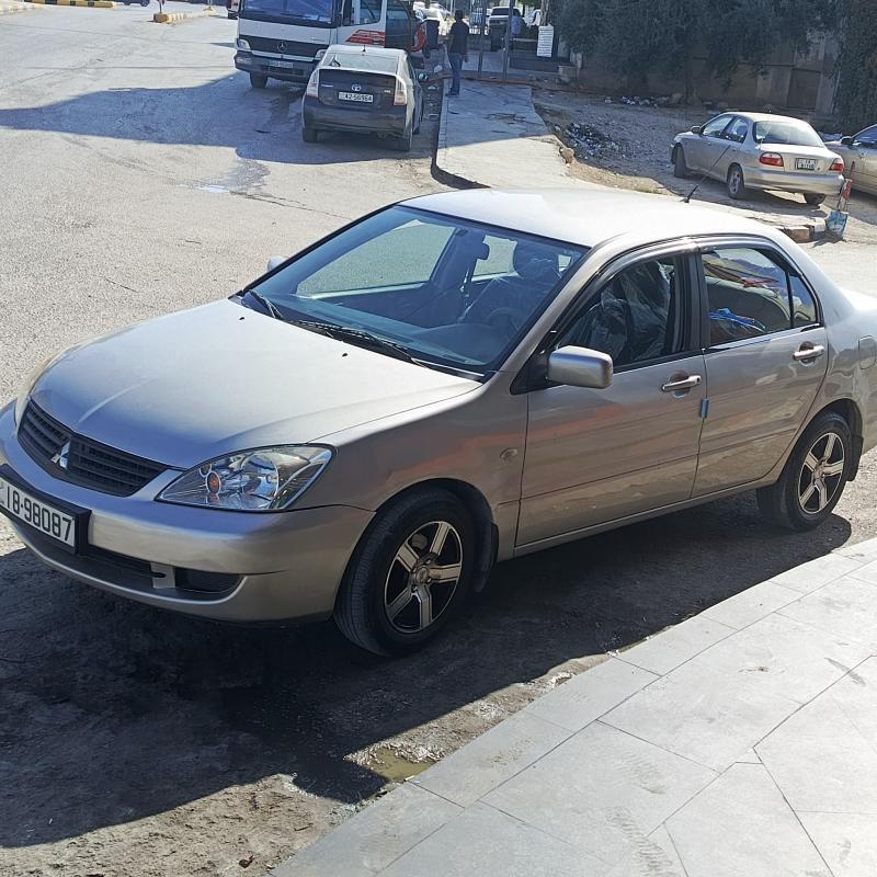 لانسر 2010 ماتور 1300فحص 3 جيد ماتور و