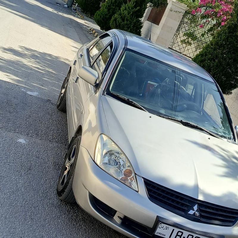 لانسر 2010 ماتور 1300فحص 3 جيد ماتور و