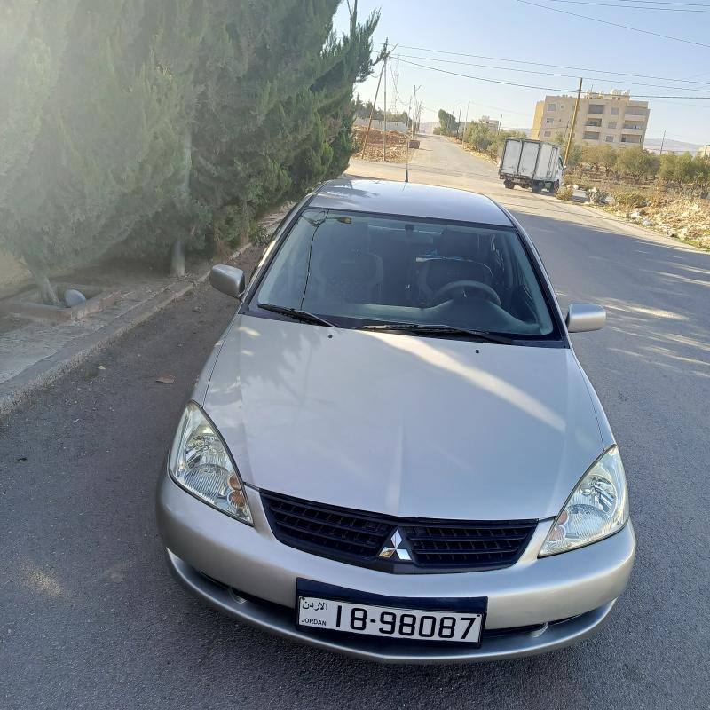 لانسر 2010 ماتور 1300فحص 3 جيد ماتور و