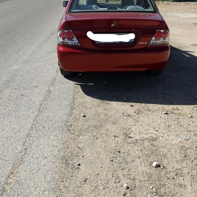 ميتسوبيشي. لانسر  2009 GLX