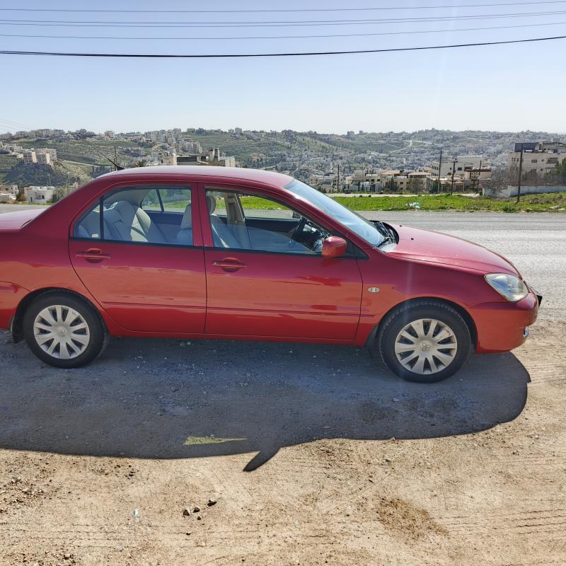 ميتسوبيشي. لانسر  2009 GLX