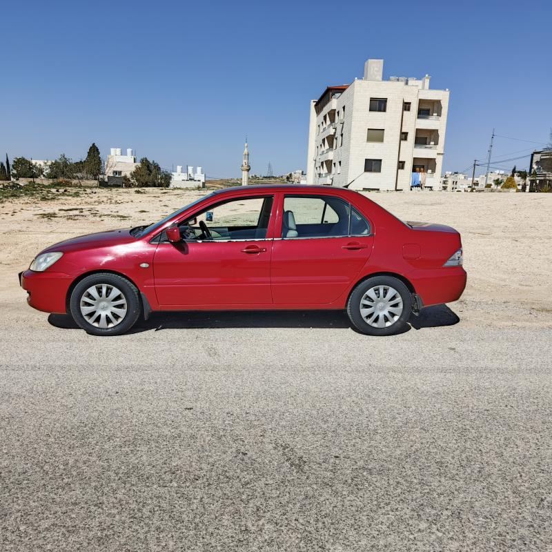 ميتسوبيشي. لانسر  2009 GLX